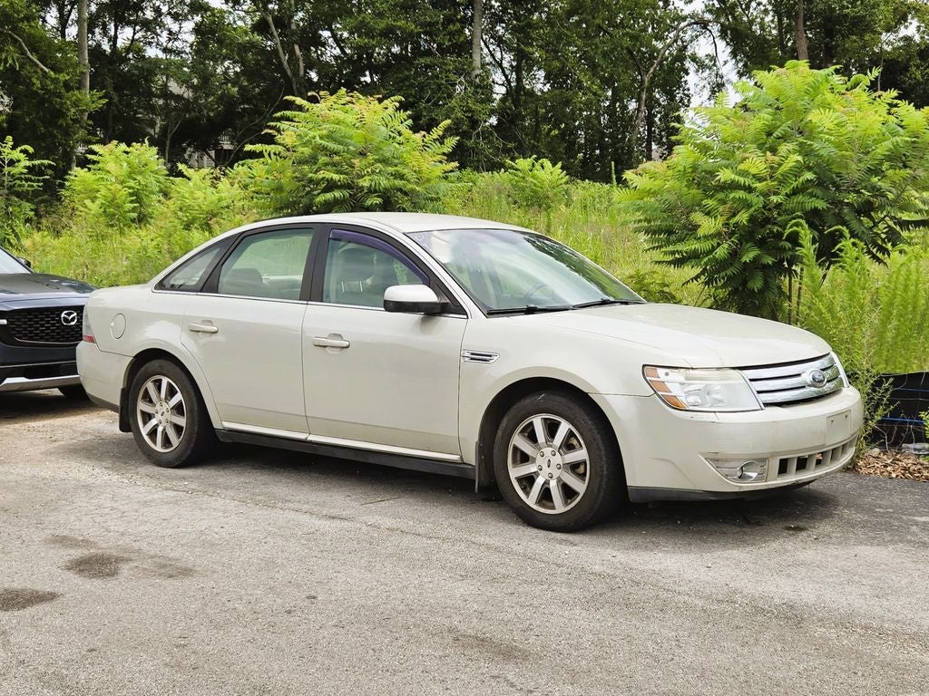 2008 Ford Taurus SEL in Dune Pearl Clearcoat Metallic — front three-quarter view