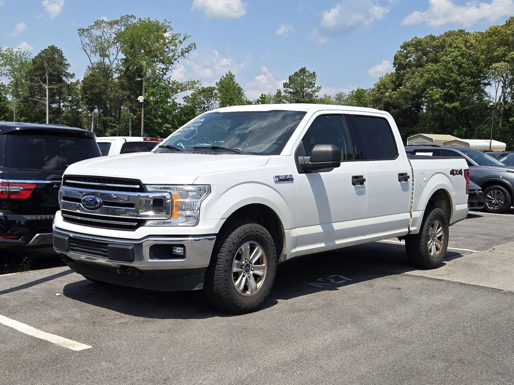 2018 Ford F-150 XLT in Oxford White — front three-quarter view