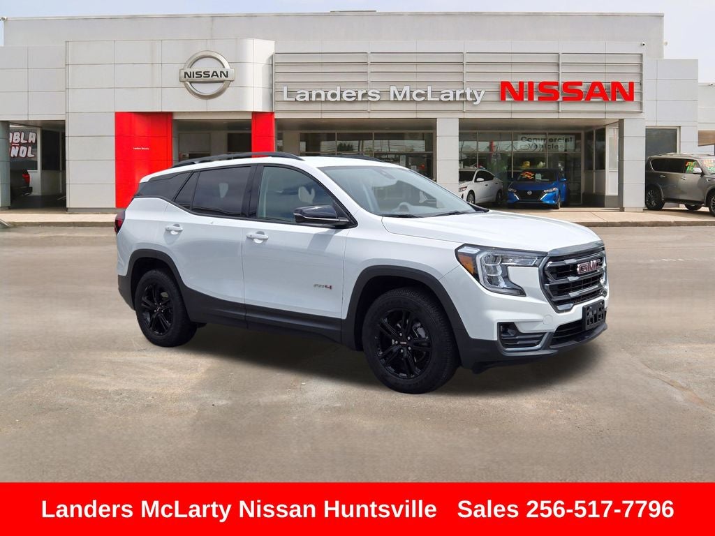 2024 GMC Terrain AT4 in Summit White — front three-quarter view