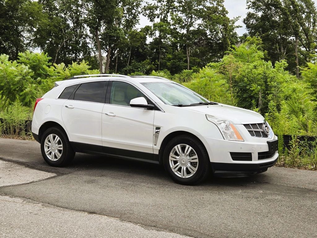 2010 Cadillac SRX Luxury in Platinum Ice Tricoat — front three-quarter view