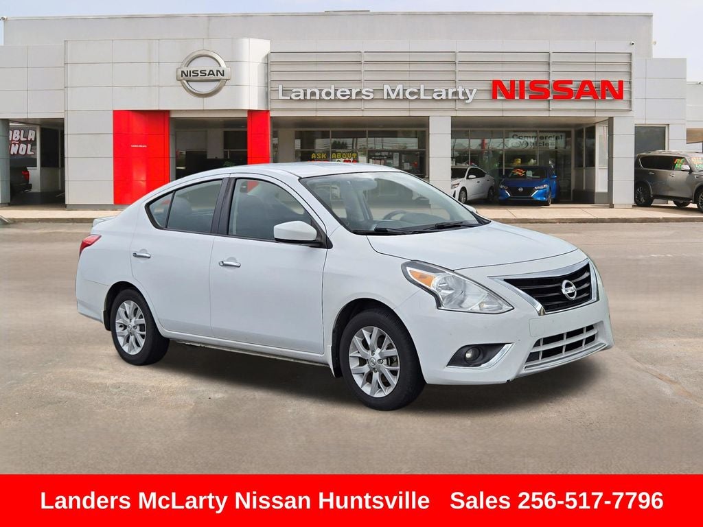 2018 Nissan Versa 1.6 SV in Fresh Powder — front three-quarter view