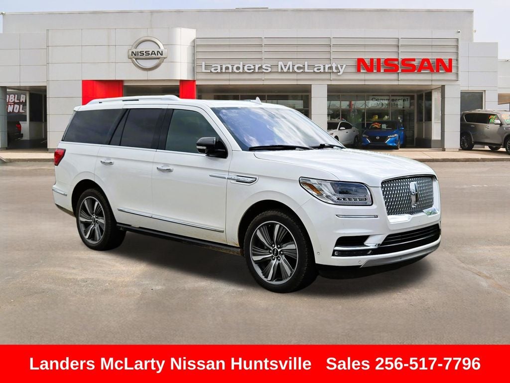 2019 Lincoln Navigator Reserve in White Platinum Clearcoat Metallic — front three-quarter view