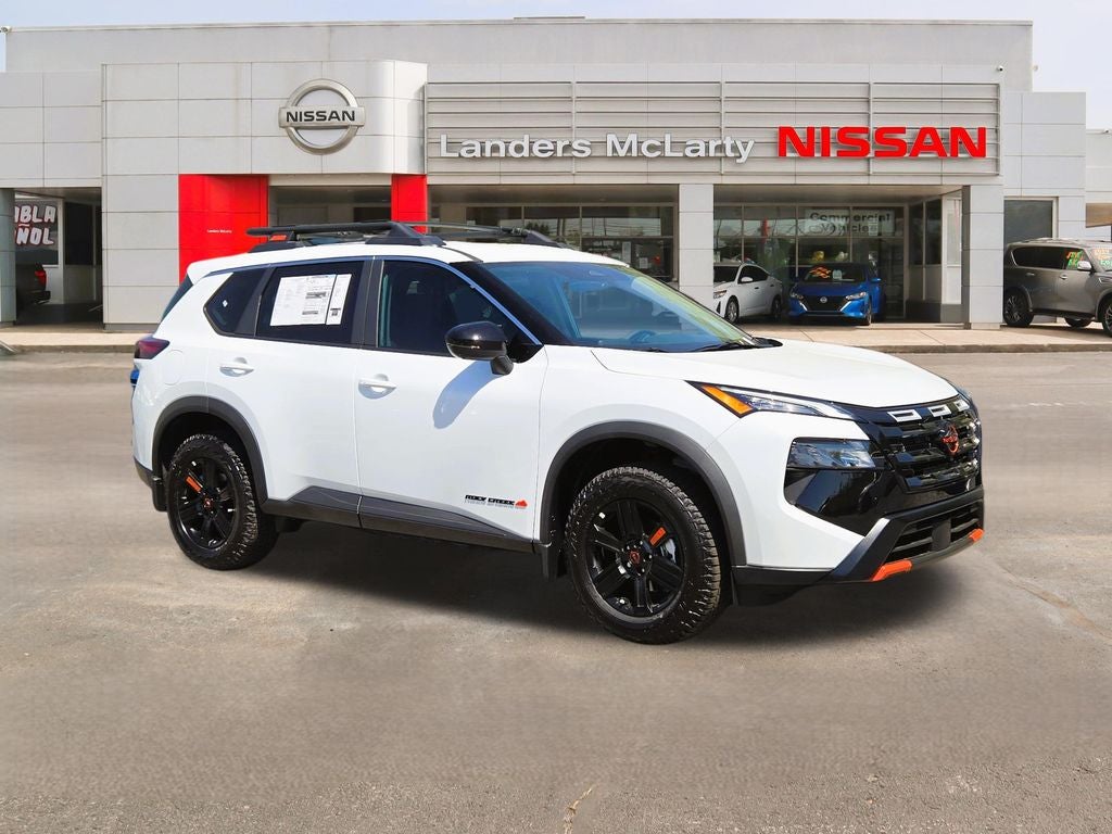 2026 Nissan Rogue Rock Creek in Everest White Pearl Tricoat — front three-quarter view
