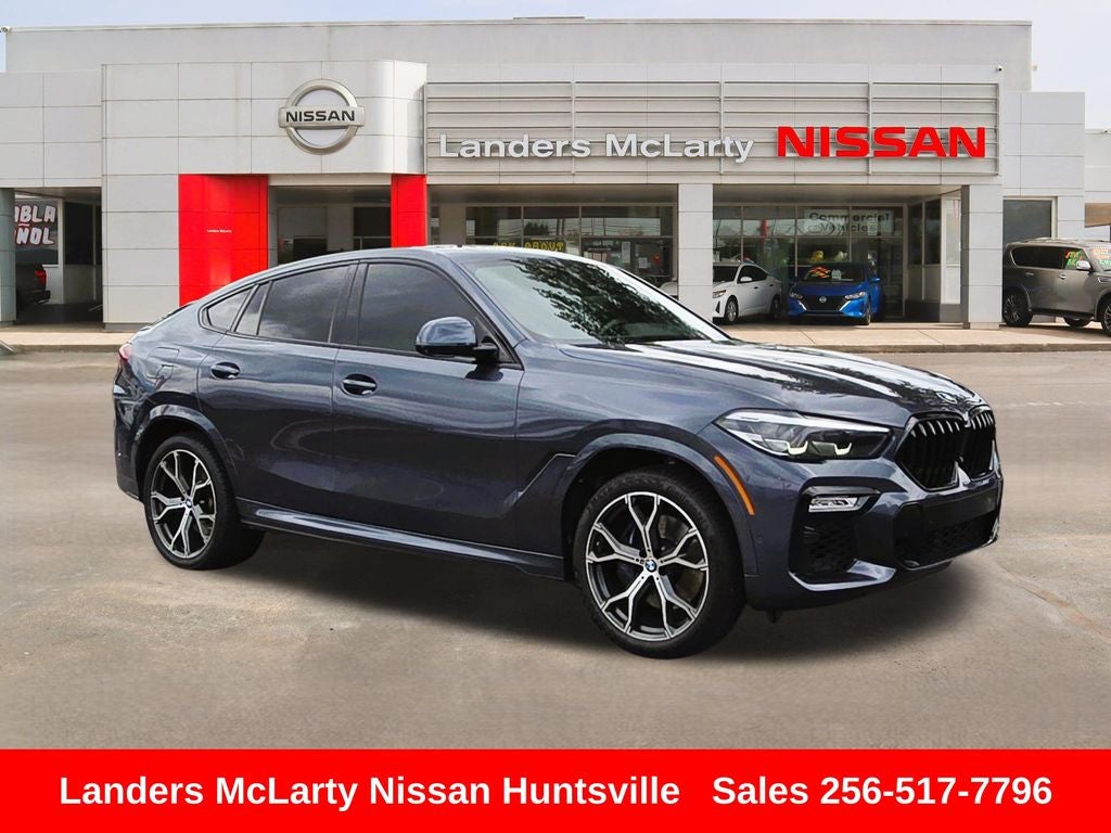 2021 BMW X6 xDrive40i in Arctic Gray Metallic — front three-quarter view