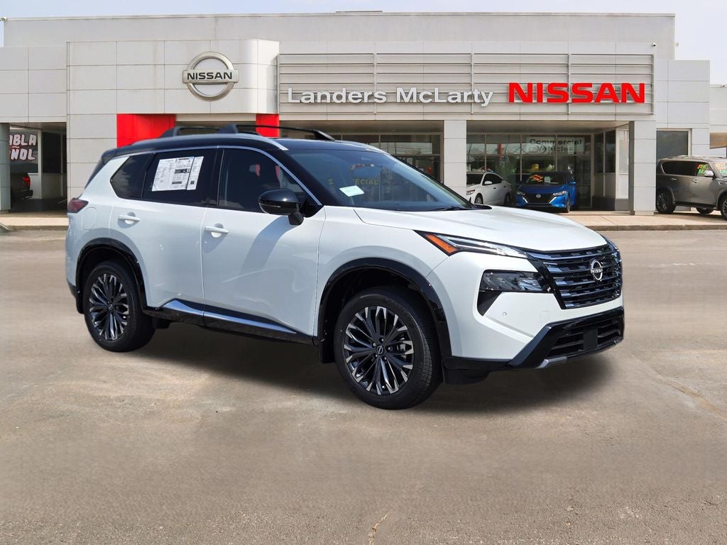 2026 Nissan Rogue Platinum in Everest White Pearl/Super Black — front three-quarter view