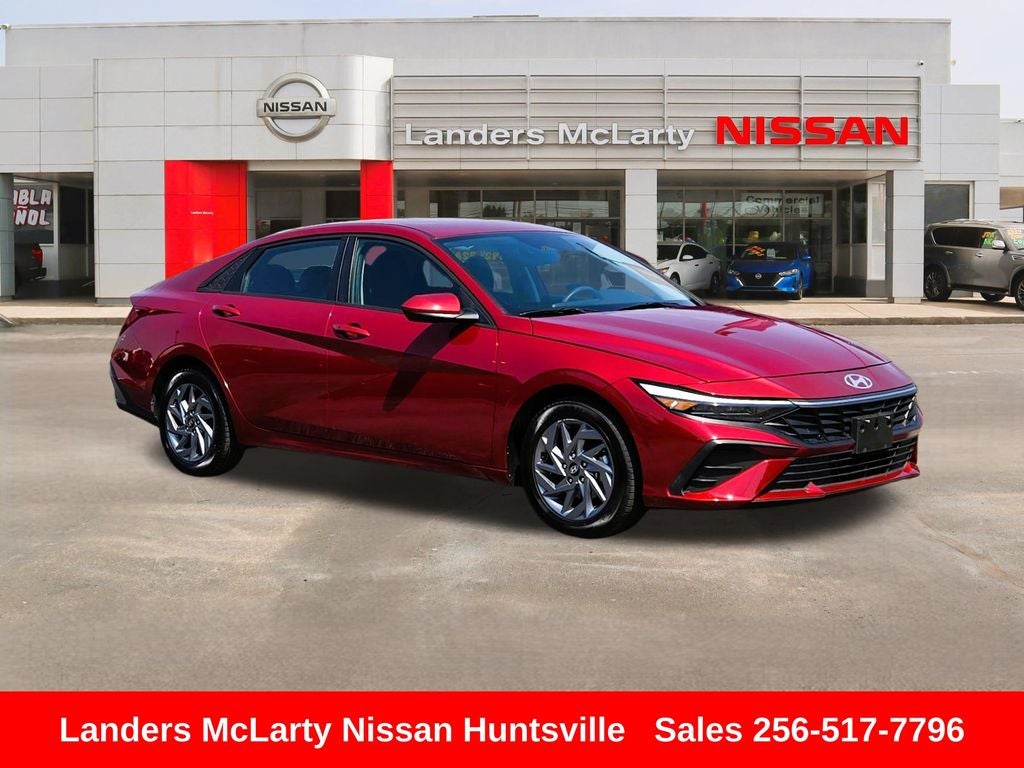 2024 Hyundai Elantra SEL in Ultimate Red — front three-quarter view