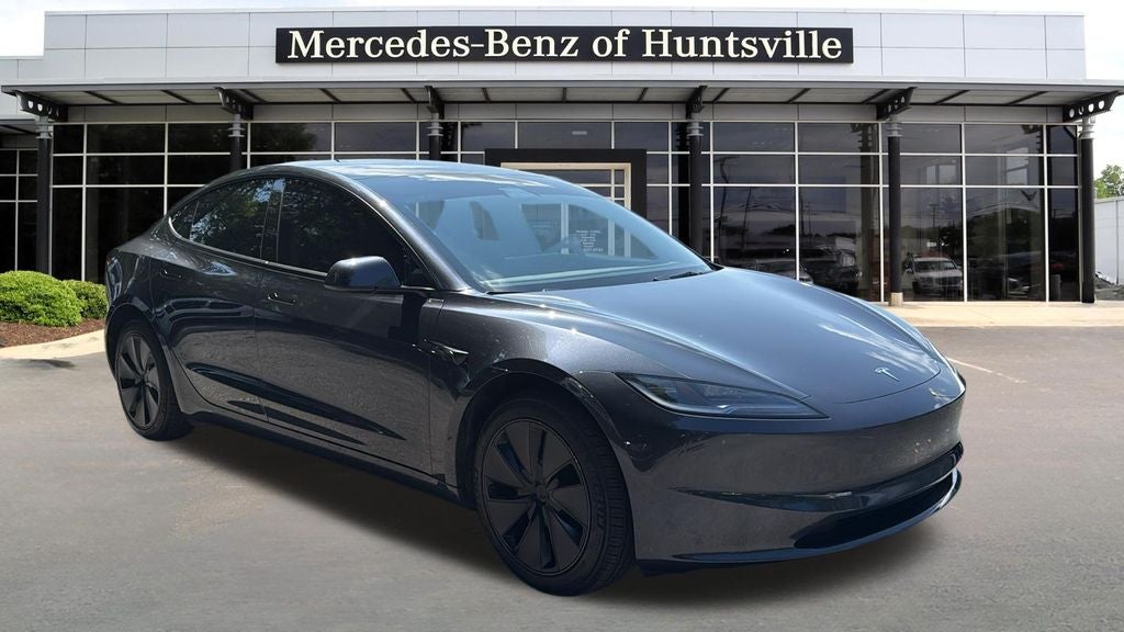 2025 Tesla Model 3 Long Range in Stealth Gray — front three-quarter view