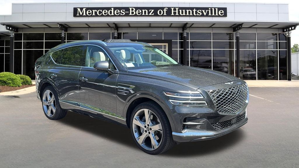 2024 Genesis GV80 3.5T PRESTIGE AWD in Makalu Gray — front three-quarter view